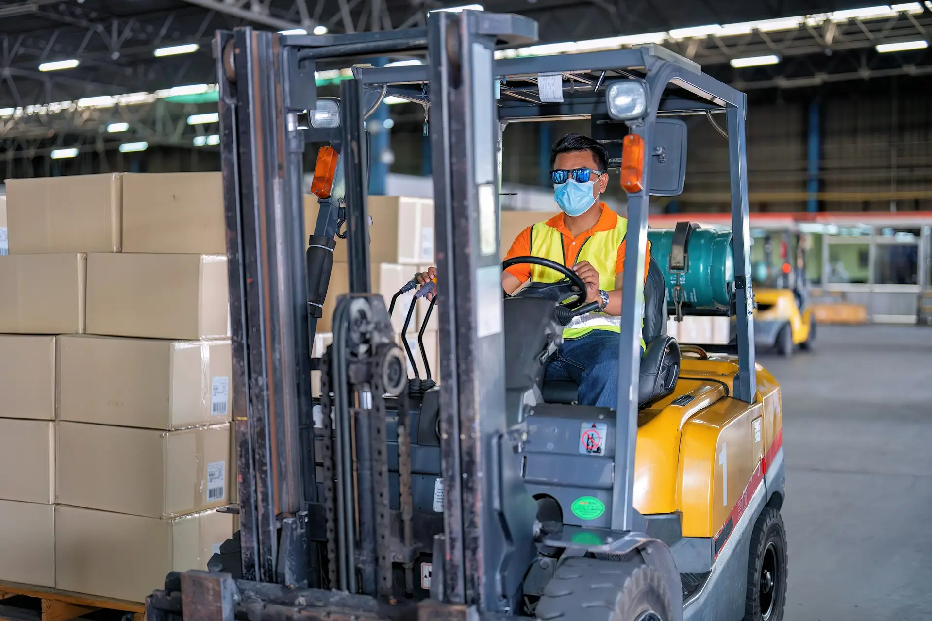 Real-time forklift tracking system — mobile beacon installed on warehouse forklift